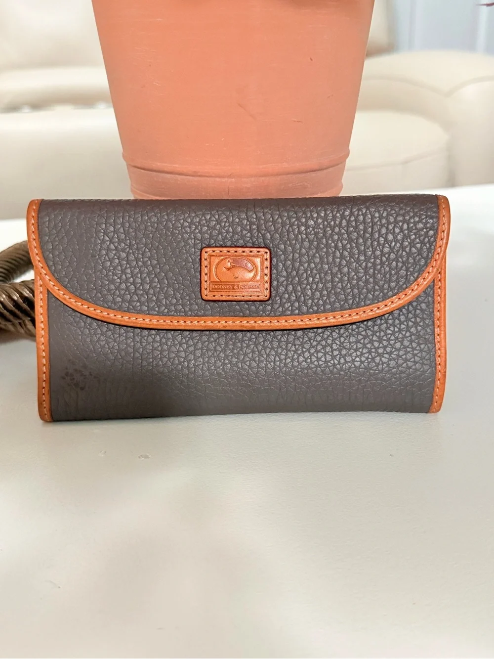 Dooney & Bourke Gray Pebbled Leather Wallet with Orange Trim